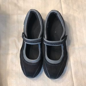 Champion closed-toe shoe, black with silver trim, size 8.5